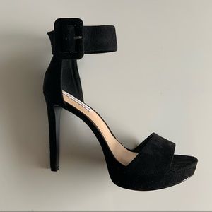 Black platform heels with buckle